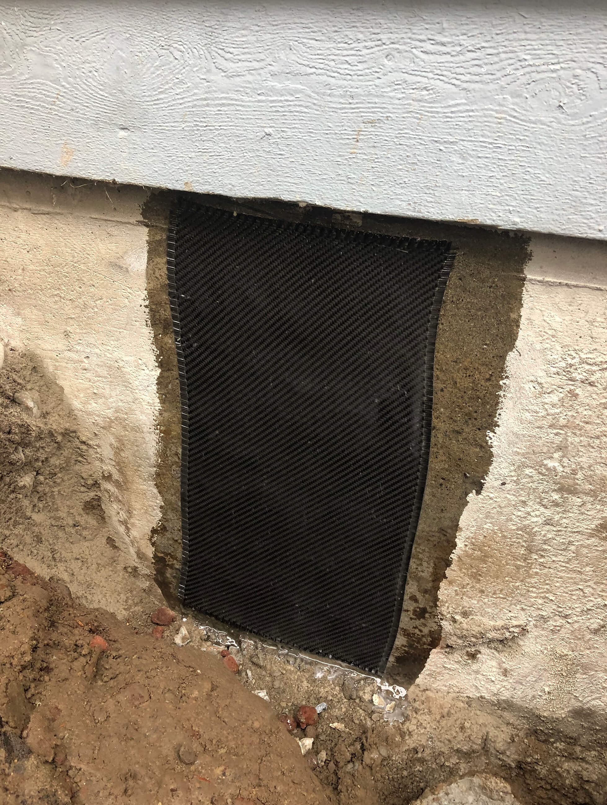 Carbon fiber reinforcement applied to a cracked stem wall