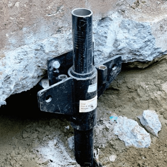 Alaskan Earthquake Recovery, Anchorage, AK — helical piles, 63 piles